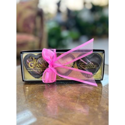 DiBella Flowers & Gifts Las Vegas - Sweet, charming, and made to delight, this small gift box features three handcrafted heart-shaped chocolate truffles, each filled with smooth, decadent ganache and coated in premium chocolate. Finished with a cute pink ribbon, this box is perfect for romantic gestures, celebrations, or a thoughtful little treat. Ideal for gifting, sharing, or savoring on your own, it’s a beautiful way to say “I’m thinking of you.”