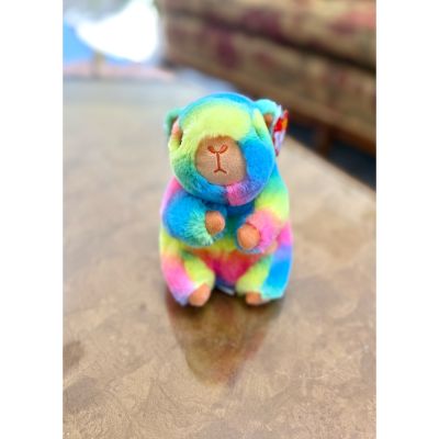 DiBella Flowers & Gifts Las Vegas - Savanna is a bright rainbow capybara with super soft, colorful fur and big sparkly eyes. Her vibrant pattern makes her stand out, while her cuddly shape keeps her extra lovable. She’s a cheerful and unique friend perfect for any Beanie Boo collection.
