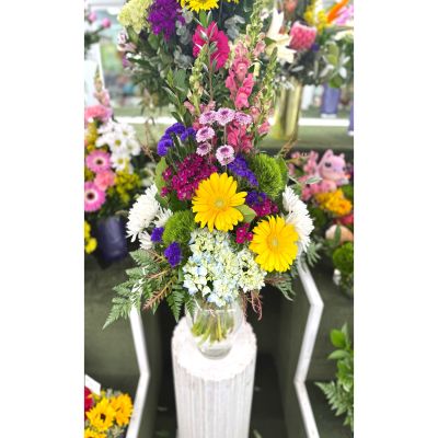 DiBella Flowers & Gifts Las Vegas - Wildflower Radiance Arrangement In the Cooler