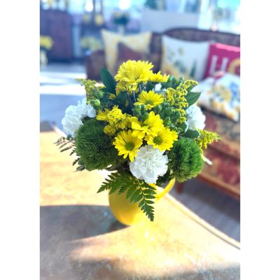 DiBella Flowers & Gifts Las Vegas - Brighten someone’s day with the Sending Smiles Pitcher Bouquet! This cheerful arrangement features a mix of fresh green berries, elegant white carnations, playful yellow daisies, and other seasonal blooms, all beautifully arranged in a sunny yellow pitcher. Perfect for gifting or adding a pop of color to any space, this bouquet brings joy and warmth wherever it goes.