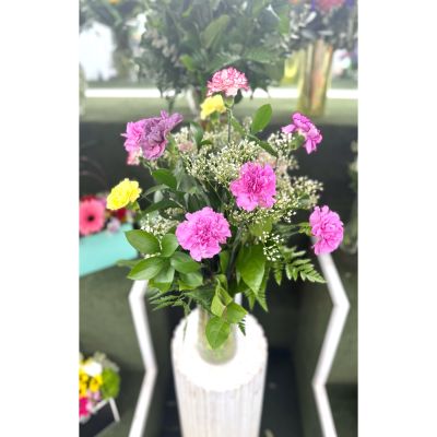 DiBella Flowers & Gifts Las Vegas - Dozen Colorful Carnations Arrangement In the Cooler