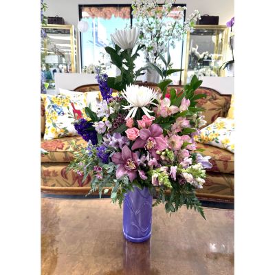 DiBella Flowers & Gifts Las Vegas - Celebrate Mom with the Lavender Love Bouquet, a stunning Mother’s Day arrangement from DiBella Flowers and Gifts designed to impress with every detail. Featuring elegant orchids, soft pink roses, delicate snapdragons, and crisp white blooms in a modern lavender vase, this bouquet captures the beauty of spring in a luxurious, garden-style design. Perfect for those searching for Lavender Love Bouquet same-day delivery Las Vegas or Mother’s Day flower delivery Las Vegas, this arrangement offers fresh, premium flowers and a high-end presentation. Trust DiBella Flowers and Gifts for reliable same-day Las Vegas flower delivery and send a heartfelt, unforgettable surprise straight to Mom’s door.