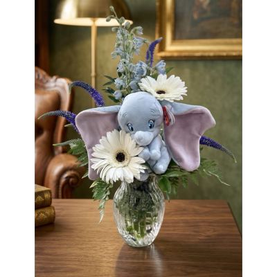 DiBella Flowers & Gifts Las Vegas - Little Elephant Wishes is a sweet floral arrangement featuring white blooms, soft blue accents, and greenery with an adorable little elephant tucked inside. A charming gift from DiBella Flowers and Gifts in Las Vegas for a new baby, birthday, or just because.