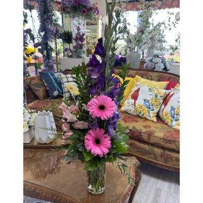 DiBella Flowers & Gifts Las Vegas - A beautiful cylinder base with bright Gladiolus, Gerber daisies, and Alstroemeria lilies 