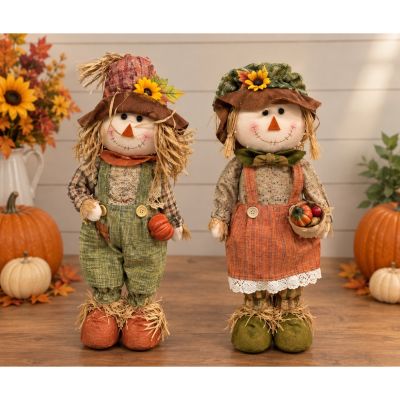 DiBella Flowers & Gifts Las Vegas - Rusty and Rosie are an adorable boy-and-girl scarecrow pair ready to bring country charm to your fall décor. Perfect for autumn displays, thoughtful seasonal gifts, or adding a friendly touch to your home from DiBella Flowers and Gifts.