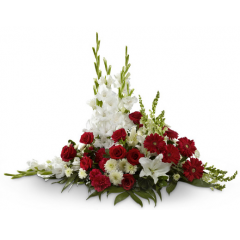 Relles Florist Sacramento - The Crimson & White Arrangement is a lovely symbol of peace and love. Red roses, carnations and gerbera daisies pop against the white blooms of gladiolus, snapdragons, Oriental lilies, and chrysanthemums. Accented with a variety of lush, vibrant greens, this exquisite arrangement is a beautiful tribute to the deceased.  About 26"w x 24" t. 