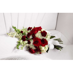 Relles Florist Sacramento - The Forever in Our Hearts Casket Adornment is a beautiful accent piece that adds that extra touch of elegance to their final farewell service. Red roses and mini carnations are eye-catching and bright arranged amongst white hydrangea, larkspur, snapdragons and Queen Anne's Lace. Tied together with a white grosgrain ribbon, this gorgeous bouquet is a lovely way to say goodbye to your beloved.  <br>