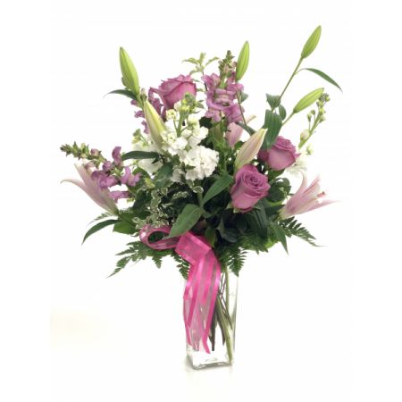 Relles Florist Sacramento - A stunning floral arrangement featuring the vibrant presence of stock flowers, the tall and spiky allure of snapdragons, and the timeless beauty of 40cm color roses. Complemented by the exotic and fragrant Oriental lilies, this bouquet is a harmonious blend of textures and colors, creating an eye-catching and elegant display. Meticulously crafted, the arrangement highlights the richness of stock, the vertical interest of snapdragons, and the classic charm of roses, all enhanced by the captivating presence of Oriental lilies. With same-day delivery, this arrangement ensures a prompt and luxurious surprise, making it an ideal choice for expressing sentiments of admiration, celebration, or heartfelt affection. Transform your space with the fresh and sophisticated beauty of this thoughtfully arranged floral ensemble.
 <br>Approx. 23"H x 14"W