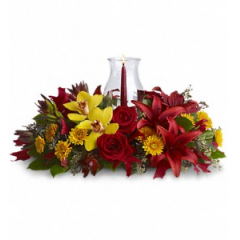Newtown Floral Company Newtown - Graceful. Glowing. Gorgeous. This stunning centerpiece will make setting the mood and the Thanksgiving table nothing less than perfect. Fall's most fabulous flowers surround a candle inside hurricane glass. Now that's true class.<br />

			Brilliant yellow cymbidium orchids, red roses, burgundy asiatic lilies, bronze cushion spray chrysanthemums, red leucadendron, eucalyptus and red oak leaves, are on dazzling display - surrounding an artisan candle and hurricane glass. A glowing way of showing gratitude.<br /><br />Approximately 22" W x 12" H<br />
Orientation: All-Around<br />
					
              
					As Shown : T178-1ADeluxe : T178-1BPremium : T178-1C
              