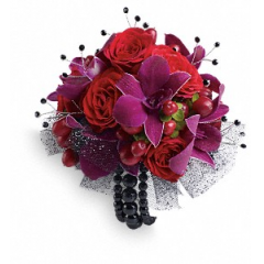Newtown Floral Company Newtown - Flirt with fame in this feminine arrangement of exotic orchids, roses and hypericum.<br />

			Purple dendrobium orchids, red spray roses and red hypericum with black rhinestone accents.<br /><br />Approximately 5 1/2" W x 5 1/2" H<br />
Orientation: N/A<br />
					
              
					As Shown : TPR07-2A
              