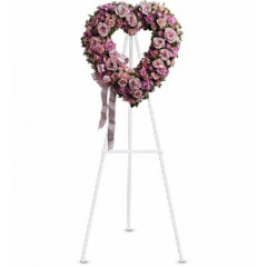 Newtown Floral Company Newtown - A tender and classic tribute to a precious life. Heartfelt emotions and sympathies find delicate expression here.<br />

			Lovely flowers such as light pink roses, hydrangea and miniature carnations mix with lavender button spray chrysanthemums.<br /><br />Approximately 18" W x 19" H<br />
Orientation: One-Sided<br />
					
              
					As Shown : T238-2A
              