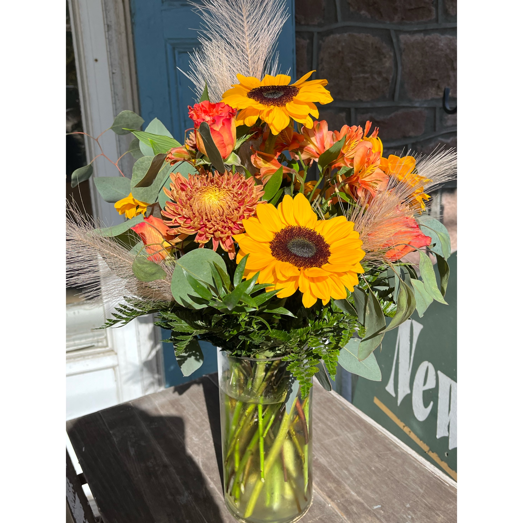 Newtown Floral Company Newtown - Gorgeous fall vase with sunflowers and fall mums with accents of faux pompas 