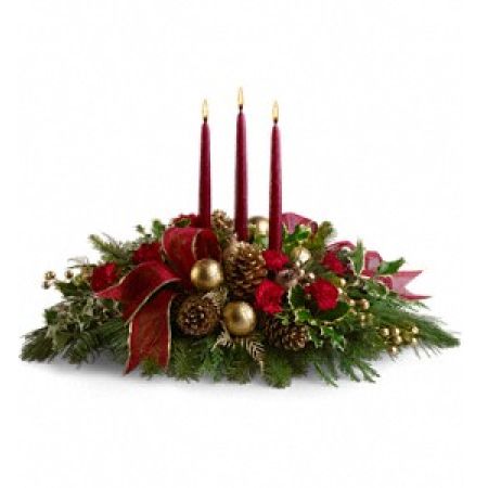 Newtown Floral Company Newtown - All will be bright this season when you order this joyful Christmas arrangement. A lovely centerpiece, it will light up the holiday festivities beautifully.<br />

			Miniature carnations are artfully on display with merry touches like shimmery ornaments, pinecones, berries, organza ribbon and holiday greens. Three graceful red taper candles add the perfect magical touch.<br /><br />Approximately 23" W x 16" H<br />
Orientation: All-Around<br />
					
              
					As Shown : T114-1ADeluxe : T114-1BPremium : T114-1C
              