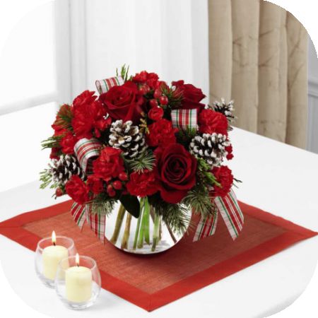 Newtown Floral Company Newtown - The FTD® Christmas Peace™ Bouquet brings beauty and grace to their home or holiday table with each elegant bloom. Rich red roses are a standout arranged amongst red carnations and mini carnations, red hypericum berries and an assortment of lush holiday greens. Accented with white pinecone pics and a red, white and green plaid designer ribbon, this fresh flower bouquet is presented in a clear glass bubble bowl vase to create a wonderful Christmas gift for any of the special people in your life.
GOOD bouquet includes 8 stems.
Approximately 11"H x 12"W.
BETTER bouquet includes 12 stems. 
Approximately 11"H x 13"W.
BEST bouquet includes 16 stems.
Approximately 14"H x 15"W.