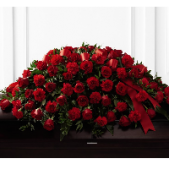 Superior Florist Ltd New York - The Full Casket Spray of Red Roses is a breathtaking and elegant tribute featuring a profusion of deep red roses. This beautiful casket spray is crafted with care to create a visually stunning and emotionally powerful display. The deep red roses symbolize love, respect, and enduring remembrance, making this arrangement a fitting tribute to a loved one. The Full Casket Spray of Red Roses serves as a profound expression of condolences, offering a dignified farewell and honoring the memory of the departed with the timeless beauty of red roses. This arrangement stands as a heartfelt and impactful tribute during moments of grief and remembrance.





