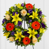 Superior Florist Ltd New York - The Rays of Solace Wreath is a striking and vibrant standing wreath designed to bring comfort and warmth. Composed with bold colors, this wreath radiates positivity and strength. The interplay of vivid hues creates a visually stunning display, symbolizing hope and solace during moments of grief. The Rays of Solace Wreath serves as a powerful and uplifting tribute, celebrating the spirit and energy of the departed. Whether expressing condolences or honoring a loved one, this wreath stands as a symbol of enduring love and offers a beautiful representation of the light that memories bring.





