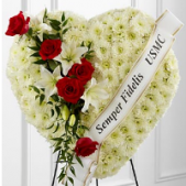 Superior Florist Ltd New York - The Warm Remembrance Heart is a poignant and elegant tribute crafted in solid white, adorned with a swag of red and white flowers. This heart-shaped arrangement symbolizes love and remembrance, with the purity of white blooms representing reverence and the red and white swag adding a touch of heartfelt sentiment. The combination creates a visually striking and emotionally resonant display. The Warm Remembrance Heart serves as a dignified and thoughtful expression of condolences, offering comfort and support during moments of loss. This arrangement stands as a symbol of enduring love and is a beautiful representation of the cherished memories shared with the departed.