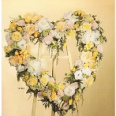 Superior Florist Ltd New York - The Yellow & White Heart is a lovely and heartwarming floral arrangement designed in the shape of a heart, featuring a delightful mix of white and yellow flowers. This arrangement symbolizes love, friendship, and the brightness of cherished memories. The white blooms represent purity and reverence, while the yellow flowers add a touch of joy and positivity to the display. The Yellow & White Heart serves as a beautiful and heartfelt tribute, offering comfort and solace during moments of remembrance. Its charming combination of colors creates a visually uplifting and meaningful arrangement, making it a thoughtful choice for honoring the memory of a loved one.





