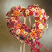 Superior Florist Ltd New York - Warm Hearts is a stunning heart-shaped wreath crafted to express love and sympathy during moments of grief. This beautiful wreath, with its intricate design, serves as a heartfelt tribute that can be customized to meet individual preferences. The option to change colors allows for personalization to suit the specific needs and tastes of those expressing condolences. Whether adorned with warm hues or tailored to a preferred color palette, Warm Hearts stands as a meaningful and visually striking expression of love and support. This wreath is a thoughtful and compassionate gesture, providing comfort and solace during difficult times.





