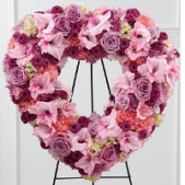Superior Florist Ltd New York - The Eternal Rest Standing Heart is a heartfelt tribute, presented as an open heart on an easel, adorned with shades of pink, lavender, and purple blooms. This arrangement symbolizes both love and the eternal rest of the departed. The carefully chosen hues come together in a gentle and comforting display, creating a harmonious expression of sympathy. The open-heart design reflects an outpouring of affection and remembrance. The Eternal Rest Standing Heart serves as a compassionate and elegant gesture, offering solace and support to those grieving. With its soft and soothing colors, this floral arrangement honors the memory of a loved one with grace and tenderness.





