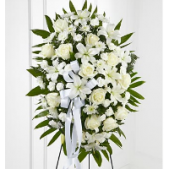 Superior Florist Ltd New York - Presenting a classic and elegant tribute, the Exquisite Tribute Standing Spray is a timeless arrangement characterized by its pristine all-white floral display. This standing spray conveys a sense of purity and reverence, creating a dignified presence that pays homage to a cherished individual. The carefully selected white blooms harmonize in a graceful arrangement, offering a symbol of solace and remembrance during moments of loss and reflection.