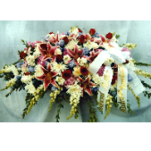 Superior Florist Ltd New York - The Multicolored Casket Spray is a beautiful and vibrant assortment designed to adorn a casket with an array of colors. Crafted with care, this casket spray features a variety of blooms in different hues, creating a visually striking and emotionally resonant display. The combination of multicolored flowers symbolizes diversity, love, and a celebration of the vibrant life of the departed. The Multicolored Casket Spray serves as a meaningful and personalized expression of condolences, offering a dignified farewell and honoring the unique spirit of the loved one. This arrangement stands as a beautiful and diverse tribute during moments of grief and remembrance.