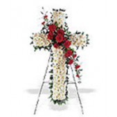 Superior Florist Ltd New York - The Floral Cross with Red Rose Swag is a reverent and beautiful arrangement that combines the symbolic cross shape with the richness of red roses. The cross, crafted with a variety of flowers, becomes a meaningful and spiritual tribute. Adorned with a swag of red roses, this arrangement adds a touch of passion and love to the overall display. The red roses symbolize love, respect, and remembrance. The Floral Cross with Red Rose Swag serves as a powerful and elegant expression of condolences, offering comfort and warmth during moments of grief. Its intricate design and heartfelt symbolism make it a fitting tribute to honor the memory of a loved one.