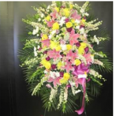 Superior Florist Ltd New York - The Lovely Pink, Purple & Yellow Arrangement is a simply gorgeous floral display, crafted with a harmonious mix of pinks, purples, and yellows. This arrangement exudes beauty and charm, capturing a vibrant and joyful spirit. The various hues come together in a delightful composition, creating a visually stunning and uplifting presentation. This arrangement is a perfect expression of appreciation, love, or celebration, suitable for a wide range of occasions. With its radiant colors and enchanting design, the Lovely Pink, Purple & Yellow Arrangement serves as a heartfelt and cheerful way to convey warm wishes and admiration