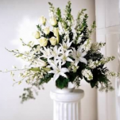 Superior Florist Ltd New York - The Classic All-White Floral Tribute is a fitting and timeless expression of sympathy, featuring an arrangement composed entirely of white flowers. This classic tribute exudes a sense of purity, reverence, and simplicity. The carefully selected white blooms come together in a harmonious display, creating an elegant and dignified expression of condolences. The all-white palette symbolizes a peaceful farewell and offers a timeless way to honor and remember a loved one. The Classic All-White Floral Tribute serves as a graceful and heartfelt gesture during moments of loss, providing comfort and solace to those in mourning.