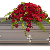 Superior Florist Ltd New York - The Red Rose Sanctuary Casket Spray is a stunning and classic arrangement featuring an abundance of red roses. This beautiful casket spray is crafted with care to create a visually impactful and emotionally resonant display. The deep red roses symbolize love, respect, and enduring remembrance, making this arrangement a timeless and fitting tribute for a loved one. The Red Rose Sanctuary Casket Spray serves as a powerful expression of condolences, offering a dignified farewell and honoring the memory of the departed with the rich symbolism of red roses. This arrangement stands as a heartfelt and beautiful tribute during moments of grief and remembrance.