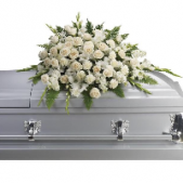 Superior Florist Ltd New York - The Silken Serenity Casket Spray is a refined and elegant arrangement featuring a selection of beautiful flowers designed to adorn the casket with grace and serenity. This casket spray is crafted with meticulous attention to detail, creating a visually pleasing and sophisticated display. The carefully chosen blooms convey a sense of peace, tranquility, and heartfelt remembrance. The Silken Serenity Casket Spray serves as a thoughtful and respectful expression of condolences, offering a dignified farewell to a loved one. Its delicate and serene beauty provides a fitting tribute, creating a comforting atmosphere during moments of grief and reflection.





