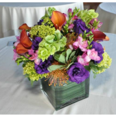 Superior Florist Ltd New York - A standout centerpiece with flashy colors.