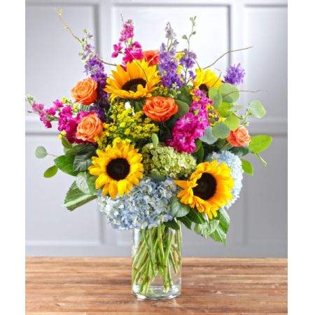 Superior Florist Ltd New York - Broadway Blooms is a vibrant and blooming bouquet designed to capture the spirit of Broadway. Featuring vibrant sunflowers along with bright pinks and purples, this arrangement brings a lively and colorful atmosphere to any space. With the option for same-day flower delivery, Broadway Blooms allows you to share this dynamic bouquet promptly for various occasions. Whether it's to celebrate, express joy, or simply brighten someone's day, this bouquet reflects the energy and vibrancy of Broadway, making it a lively and expressive choice for floral gifting.