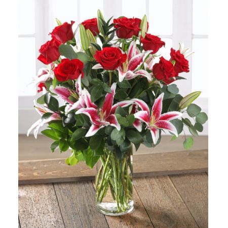 Superior Florist Ltd New York - Roses & Star Gazers is a beautiful selection of roses and stargazer lilies, carefully arranged to express your love. With the option for same-day flower delivery, you can promptly share this romantic and heartfelt bouquet for various occasions. Whether it's to convey love, celebrate a special moment, or make a thoughtful gesture, the combination of roses and stargazers creates a visually stunning and emotionally resonant display. Roses symbolize love and passion, while stargazer lilies add a touch of elegance and sophistication to this expressive floral arrangement.