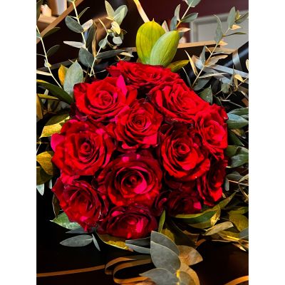 Uptown Blossoms Anchorage - Ramo Buchon style roses wrapped for presentation. 