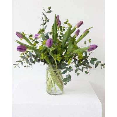 Uptown Blossoms Anchorage - Embrace the delicate beauty of spring with our 'Tulips' arrangement, a captivating bouquet of soft pink and white blooms. 
These fresh tulips, nestled with vibrant yellow accents and lush greenery, evoke feelings of joy and renewal.
Perfect for brightening a room or as a thoughtful gift to show someone you care, these flowers speak volumes without a word.
Send a touch of elegance and lasting happiness with this stunning, hand-crafted tulip bouquet today.