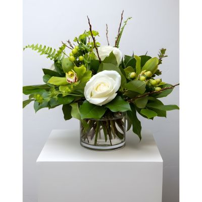 Uptown Blossoms Anchorage - A delicate harmony of romance and refinement, our ‘Orchids and Roses’ bouquet whispers sweet nothings. 
Blush pink roses and pristine white orchids intertwine, creating a captivating fragrance and visual texture. 
Presented in a charming glass vase, it's a perfect expression of love, gratitude, or simply brightening someone’s day.
Send this stunning floral arrangement to bring a touch of timeless elegance to their home or office. Other colors available.