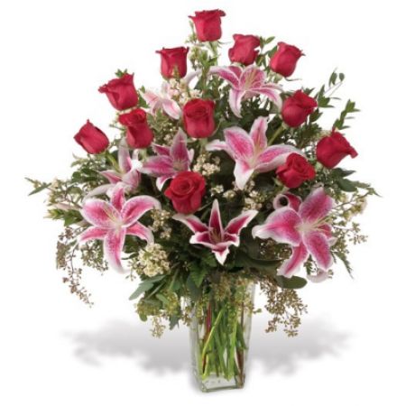 Boulder City Florist Boulder City - The Stargazing....a grand bouquet with red roses and stargazer lilies. might arrive with lilies in bud stage but will open with water added.   A seasonal favorite. comes in three sizes 


