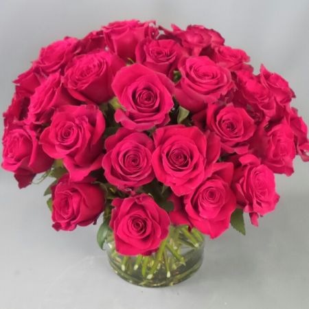 Bouquets Denver - Indulge in the opulence of three dozen (36) roses in one of three premium colors: red, white, or pink. Expertly arranged in a lush and compact European style, these elevate your gesture with the rich symbolism of romantic roses, conveying deep passion and love. Enjoy the convenience of same-day flower delivery, ensuring your elegant bouquet graces the recipient promptly. Immerse yourself in the luxurious beauty of this meticulously-crafted arrangement that captures the essence of romance. Make a statement with the sophisticated allure of European styling, bringing a touch of timeless elegance to any occasion. Delight in the abundance of red roses, creating a visually stunning and emotionally resonant display. Deluxe and Premium options add higher-end complimenting blossoms and specialty vases.






