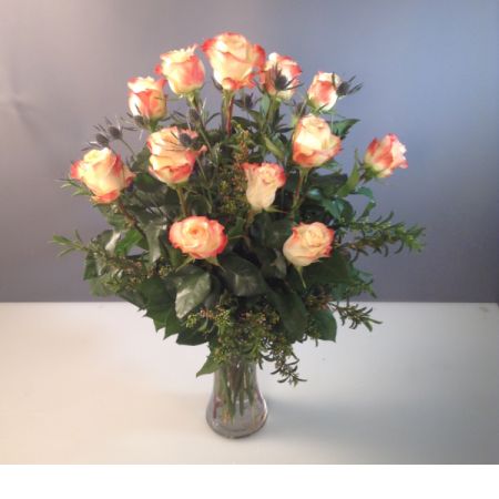 Bouquets Denver - Elevate your gesture with a dozen roses, expertly arranged in a tall vase. Choose from a myriad of colors by specifying your first and second choices in the notes. Enjoy the convenience of same-day flower delivery, ensuring your thoughtful gift arrives promptly. Delight your recipient with the timeless beauty of meticulously arranged roses. Make a statement with this classic and versatile floral display that suits any occasion. Personalize your bouquet with preferred hues, adding a touch of individuality to your heartfelt gift. Premium colors of red, white, and pink area available at a slightly higher price.







