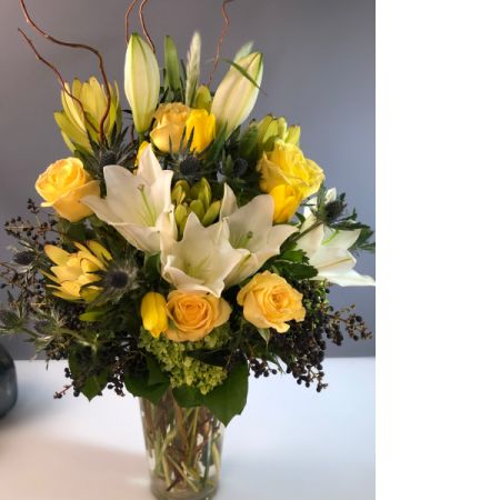 Bouquets Denver - Introducing "Sunshine's Embrace," a radiant bouquet named after the greatest joy. Share the warmth of this bouquet and tell someone "YOU Are My Sunshine" with the assurance of same-day flower delivery. Capturing the essence of joy and brightness, this arrangement is a vibrant expression of affection and positivity. Elevate your message with the symbolic charm of sunflowers and lively hues. Make a lasting impression with this thoughtful gift that embodies the spirit of happiness. Delight in the immediate delivery of this sunshine-inspired bouquet, bringing warmth and smiles to your loved one's day.